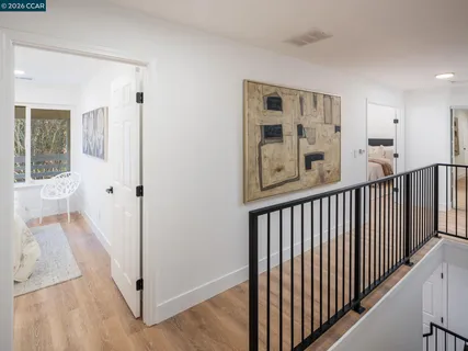 a view of swimming pool with outdoor seating and city view