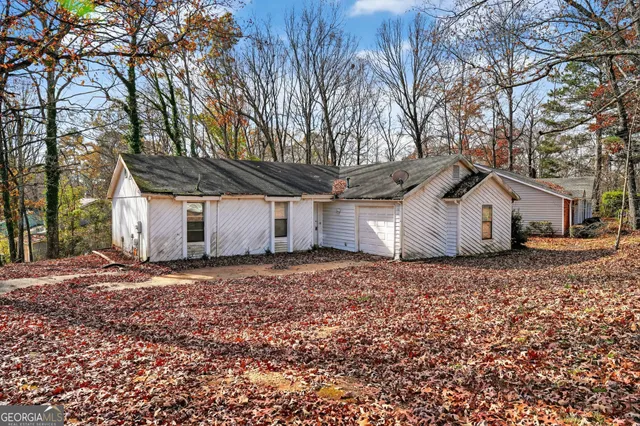 a house with a tree in front of it