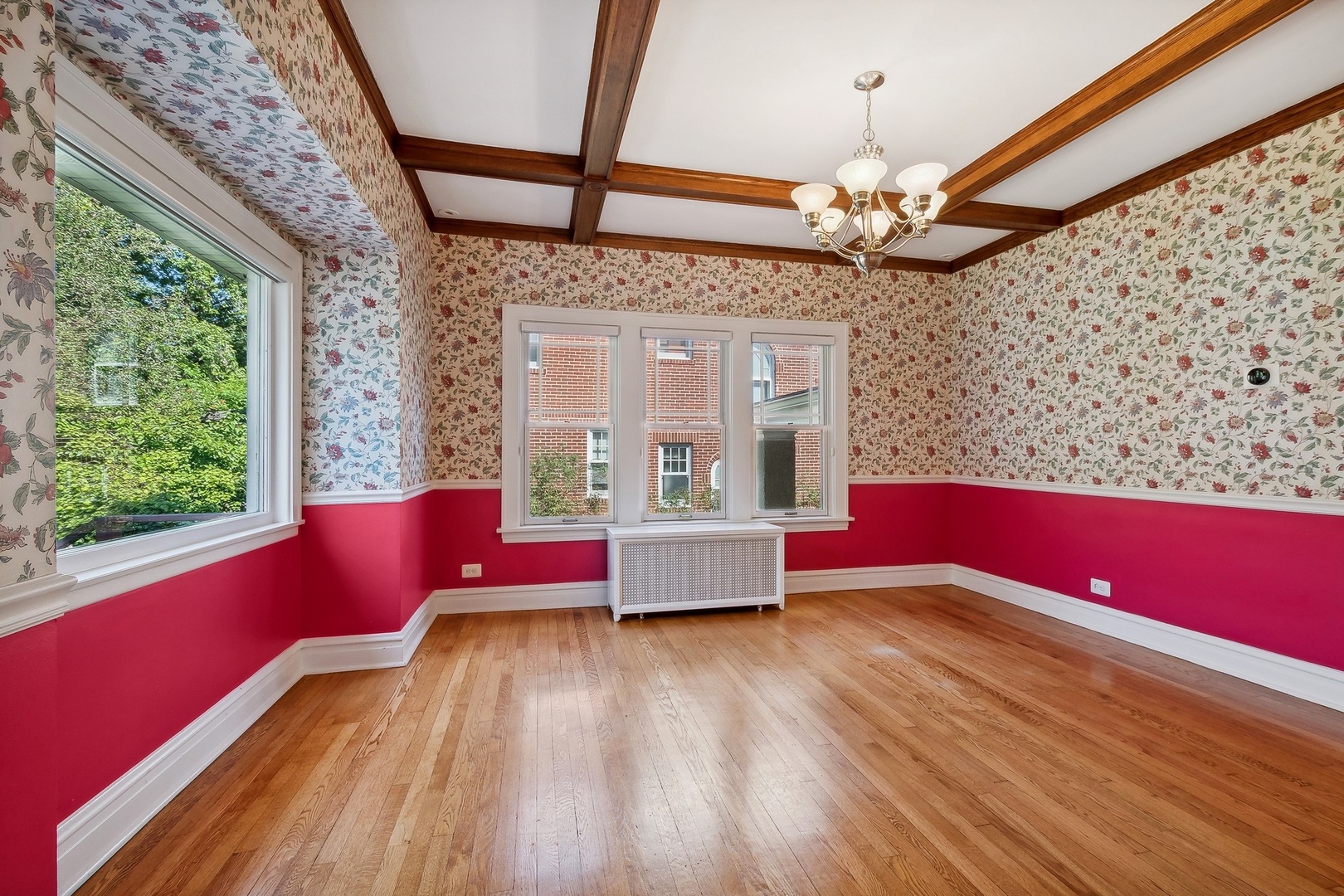 504 Maple Avenue Wilmette, IL 60091 - Photo 3 of 20 a living room with stainless steel appliances kitchen island granite countertop furniture and a window