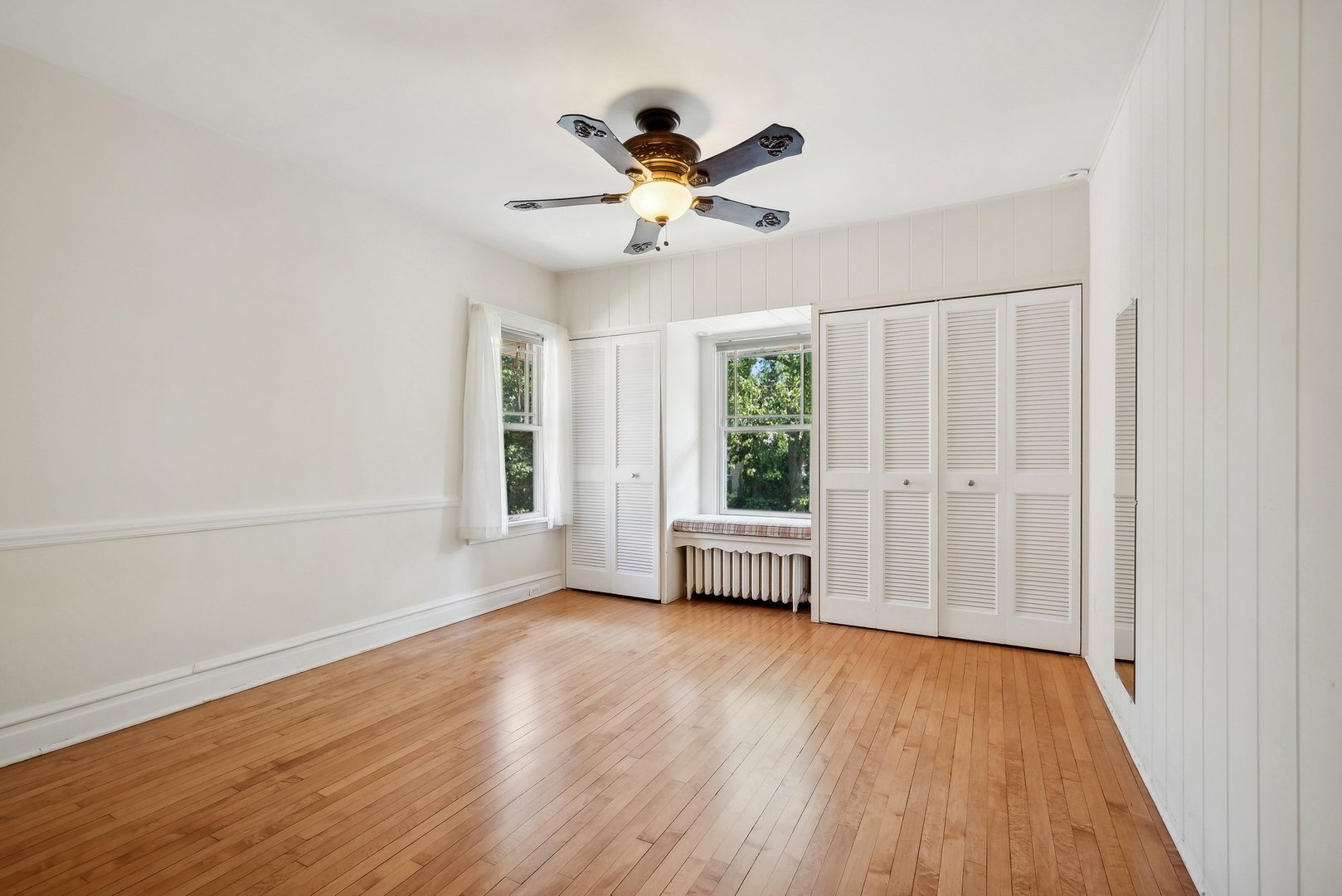 504 Maple Avenue Wilmette, IL 60091 - Photo 7 of 20 a view of livingroom with hardwood floor and window