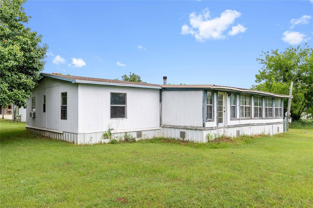210 7th Street Blanket, TX 76432 - Photo 23 of 33 a view of a house with backyard