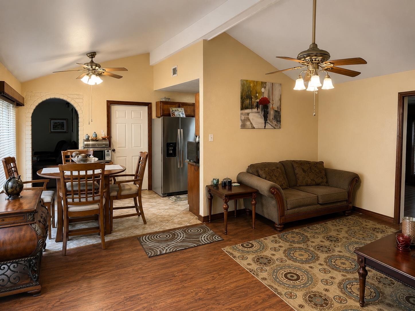 5845 Meadowview Road Beaumont, TX 77708 - Photo 7 of 24 a living room with furniture and a chandelier