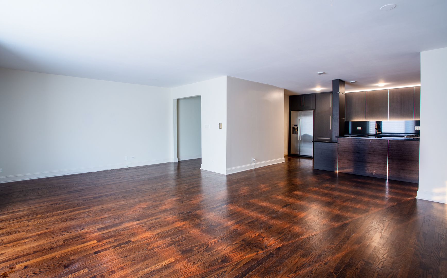 2400 Archbury Lane, Unit 1E Park Ridge, IL 60068 - Photo 10 of 18 a view of a living room a kitchen and dining room