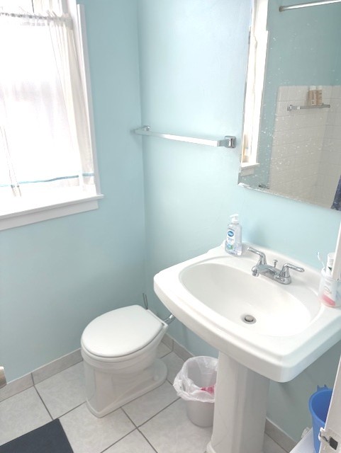 1585 Ridge Avenue, Unit 608 Evanston, IL 60201 - Photo 13 of 15 a white toilet sitting next to a bathroom sink