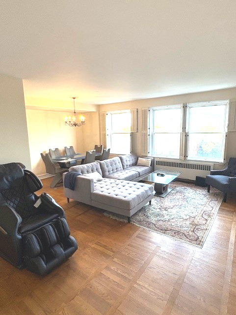 1585 Ridge Avenue, Unit 608 Evanston, IL 60201 - Photo 2 of 15 a living room with furniture and a window
