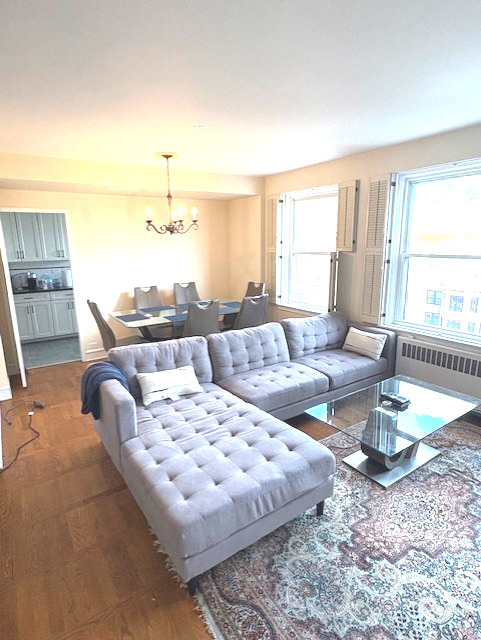 1585 Ridge Avenue, Unit 608 Evanston, IL 60201 - Photo 3 of 15 a living room with furniture and a large window