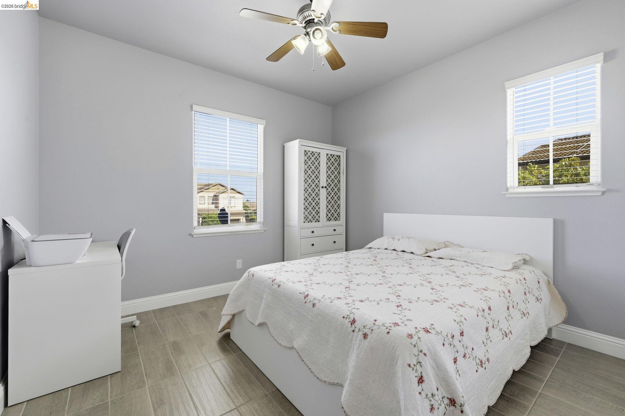4568 Le Conte Circle Antioch, CA 94531 - Photo 15 of 36 Bedroom featuring ceiling fan and wood finish floors