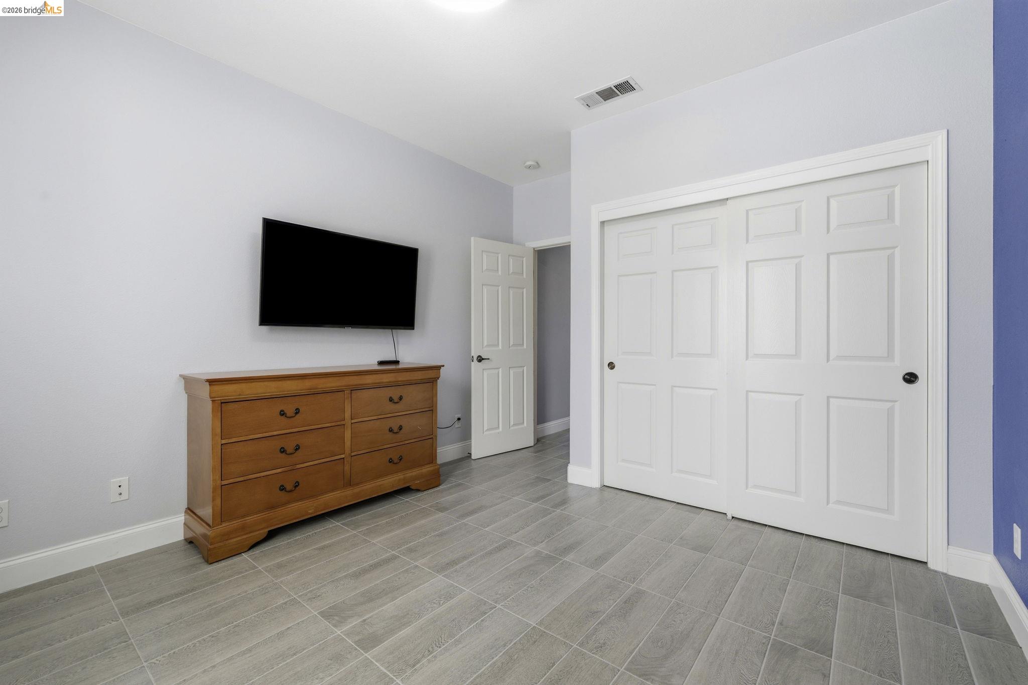 4568 Le Conte Circle Antioch, CA 94531 - Photo 16 of 36 Bedroom with baseboards and a closet