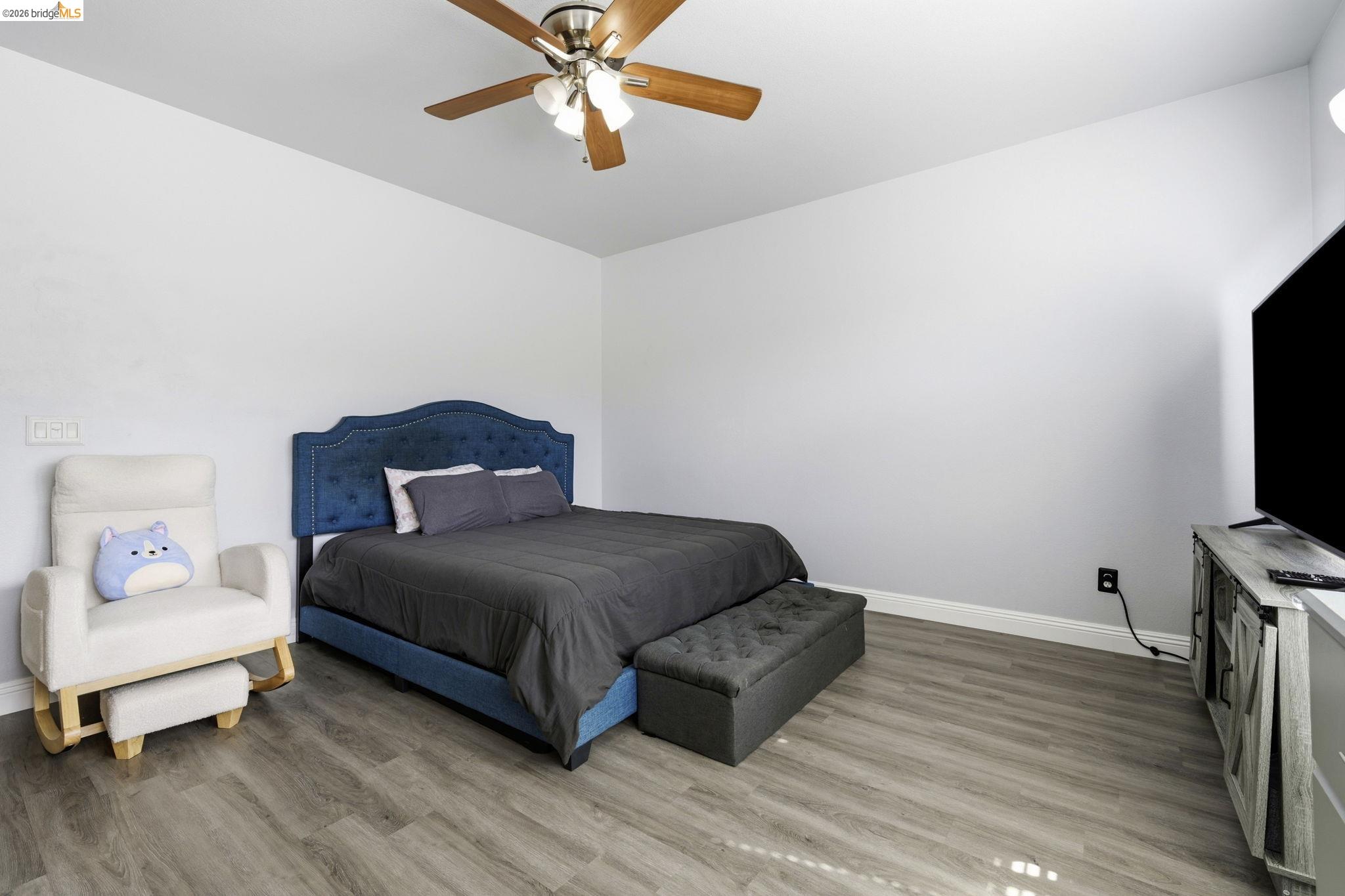 4568 Le Conte Circle Antioch, CA 94531 - Photo 22 of 36 Bedroom featuring light wood finished floors and a ceiling fan