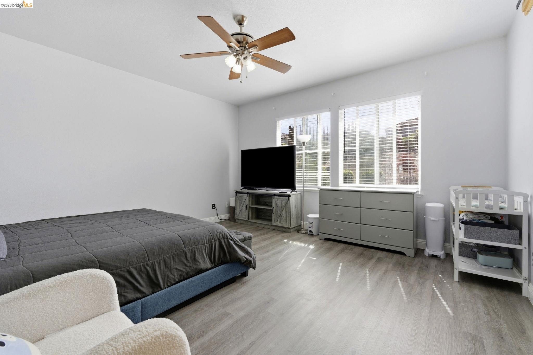 4568 Le Conte Circle Antioch, CA 94531 - Photo 23 of 36 Bedroom with light wood-style floors and ceiling fan