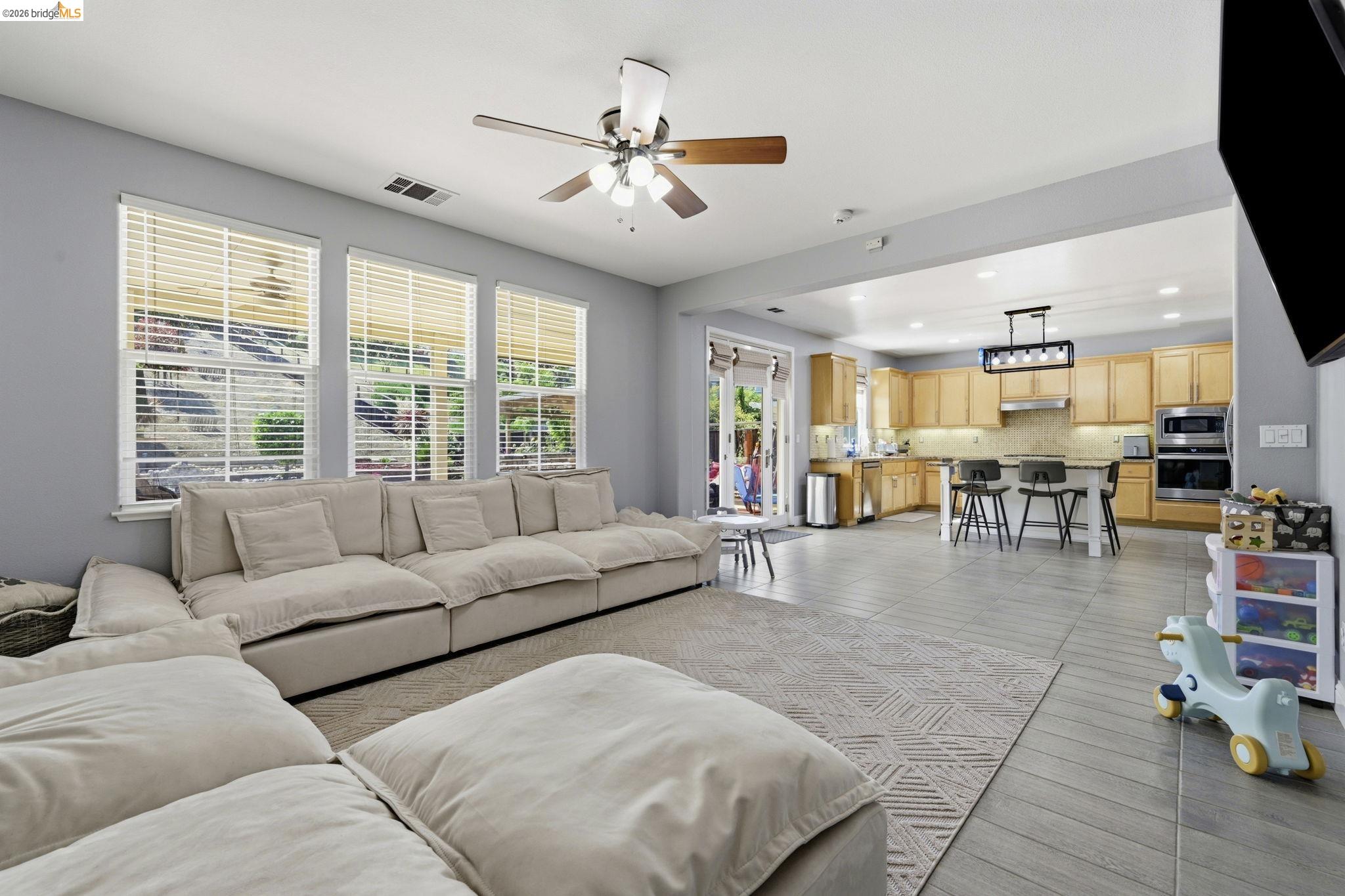4568 Le Conte Circle Antioch, CA 94531 - Photo 29 of 36 Living room featuring ceiling fan, recessed lighting, and light wood-style floors