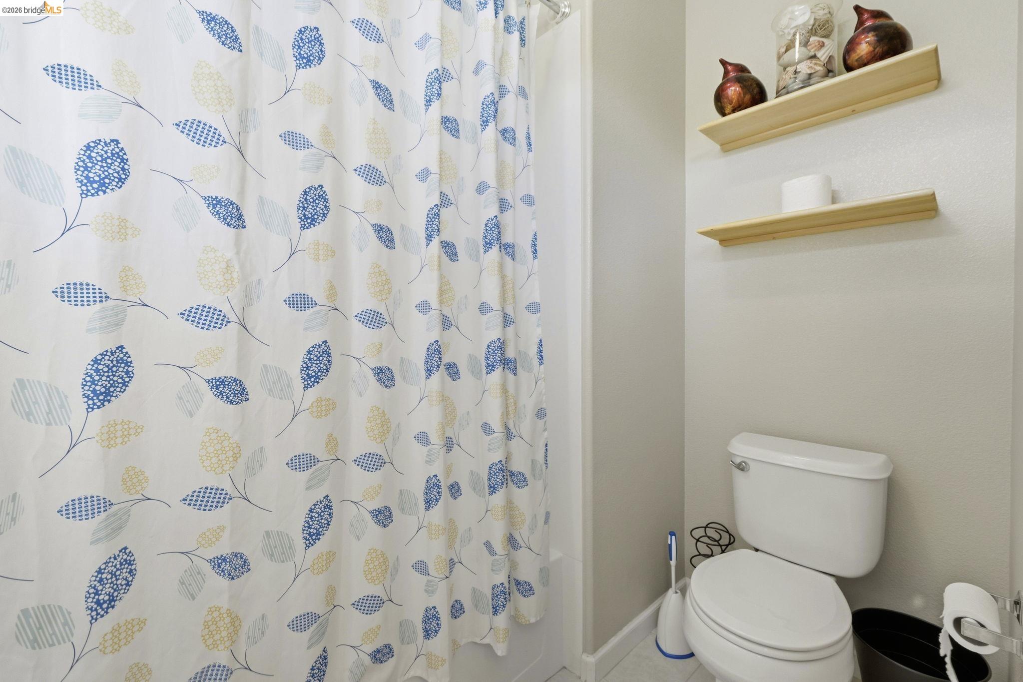 4568 Le Conte Circle Antioch, CA 94531 - Photo 10 of 36 Full bath featuring toilet and baseboards