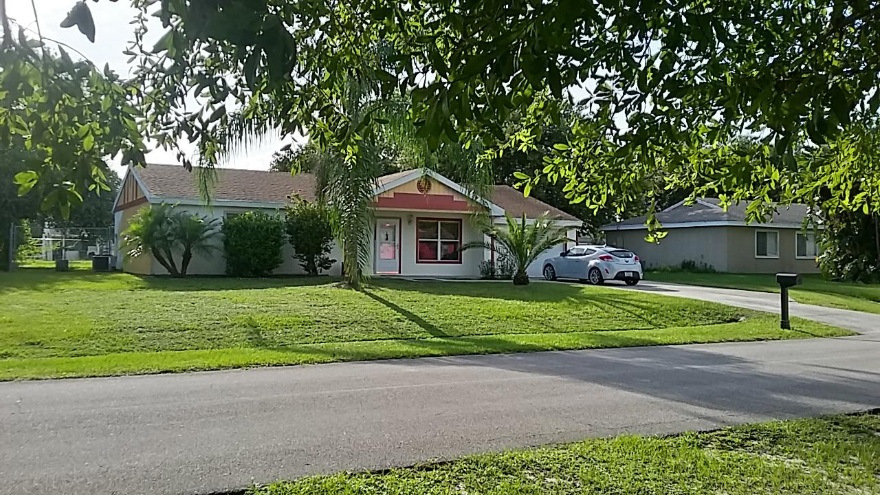210 Southwest Homeland Road Port St. Lucie, FL 34953 - Photo 1 of 41 FRONT