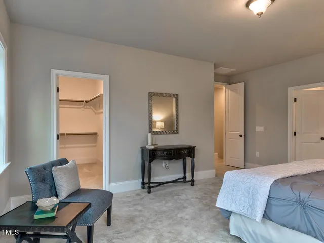 a aerial view of a house with table and chairs