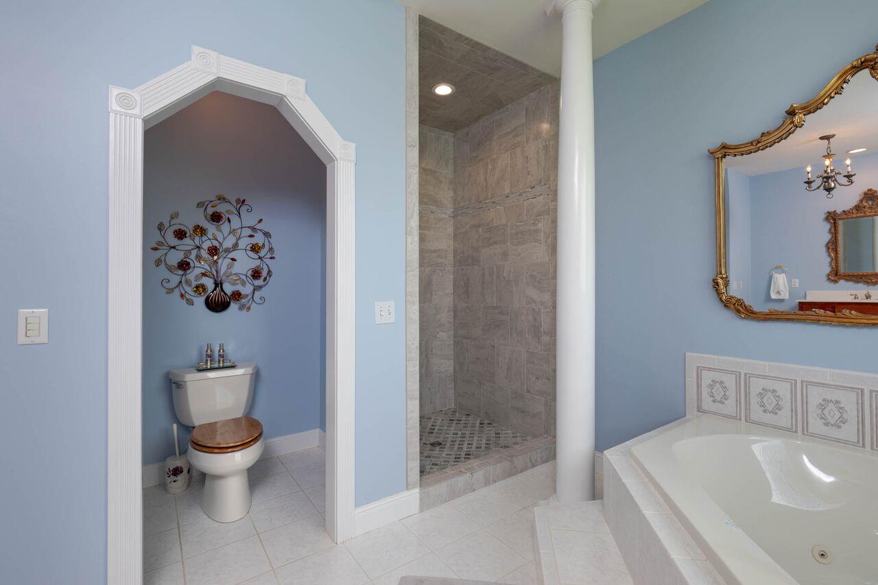 365 Normandy Road Wartrace, TN 37183 - Photo 13 of 30 a bathroom with a toilet sink and mirror