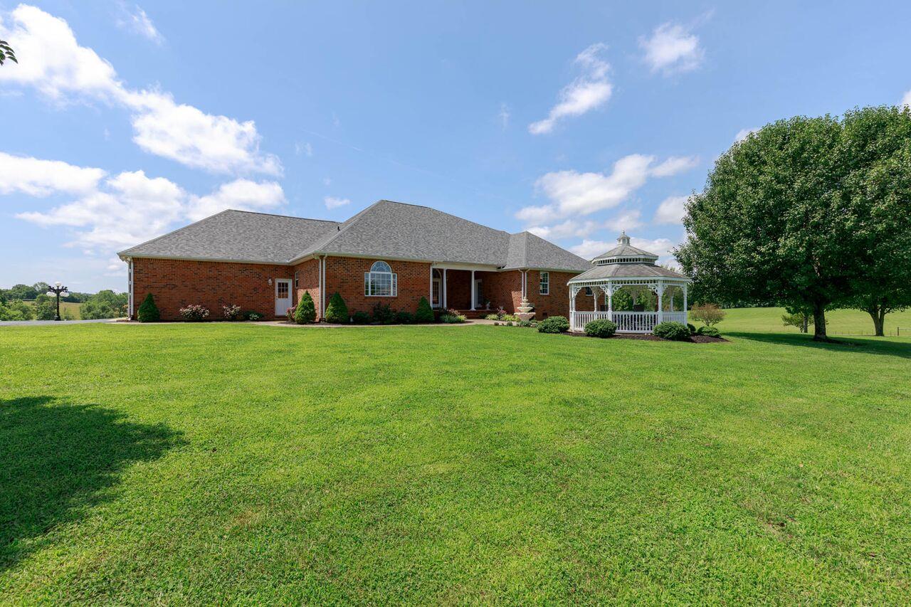 365 Normandy Road Wartrace, TN 37183 - Photo 19 of 30 a front view of a house with garden
