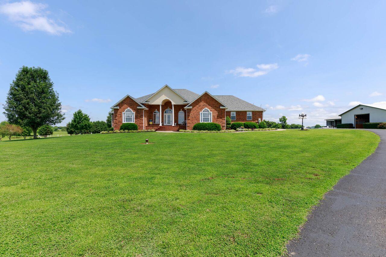 365 Normandy Road Wartrace, TN 37183 - Photo 30 of 30 a view of a house with a big yard and large trees
