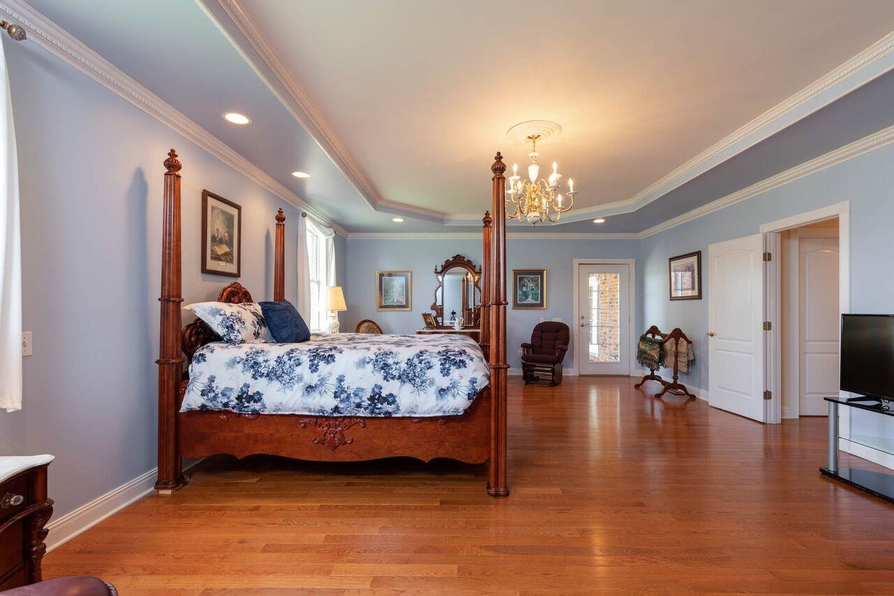 365 Normandy Road Wartrace, TN 37183 - Photo 10 of 30 a bedroom with furniture and a flat screen tv