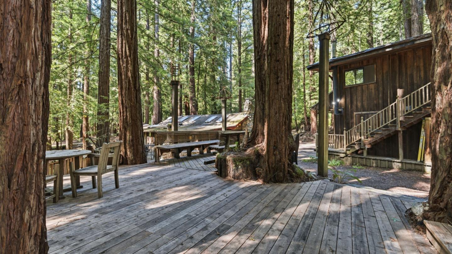 41 Back Road La Honda, CA 94020 - Photo 22 of 101 a view of deck with table and chairs and wooden floor