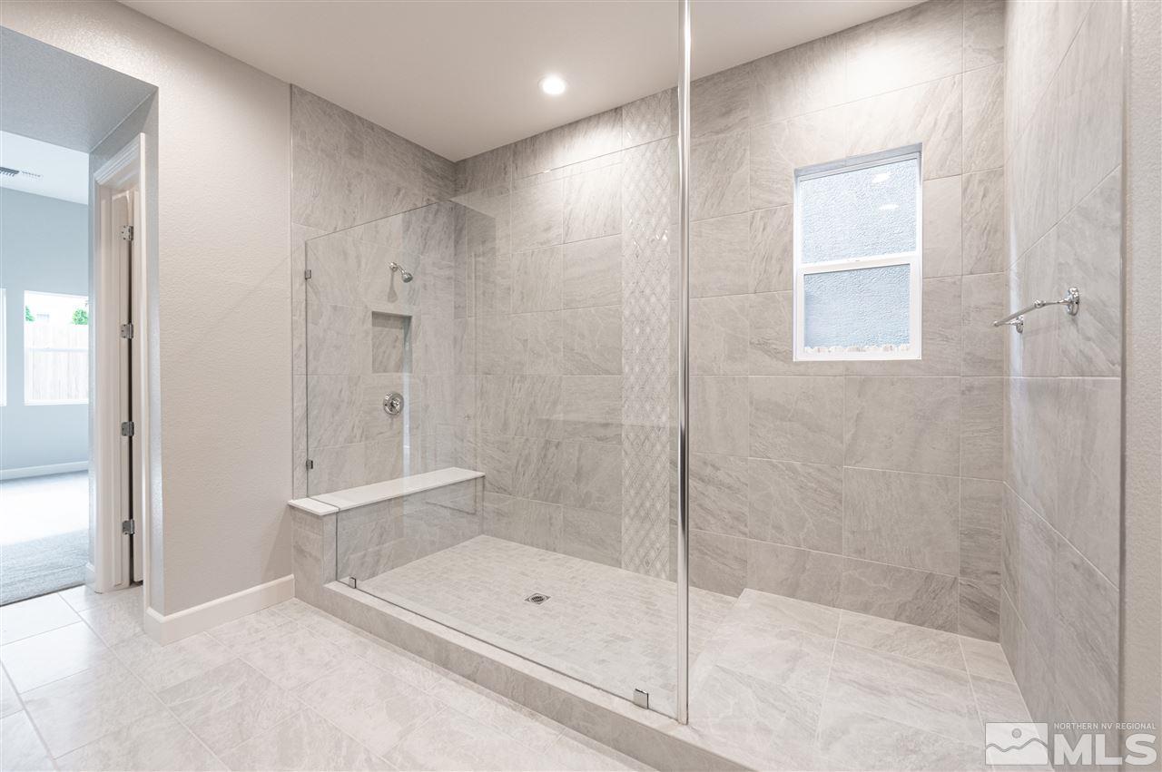 9425 Hawkshead Road, Unit HOMESITE 93 Reno, NV 89521 - Photo 11 of 11 a bathroom with a shower