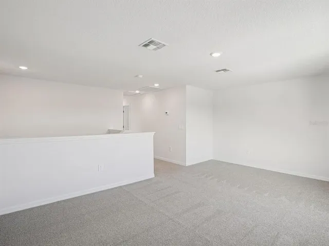 an empty room with an entryway