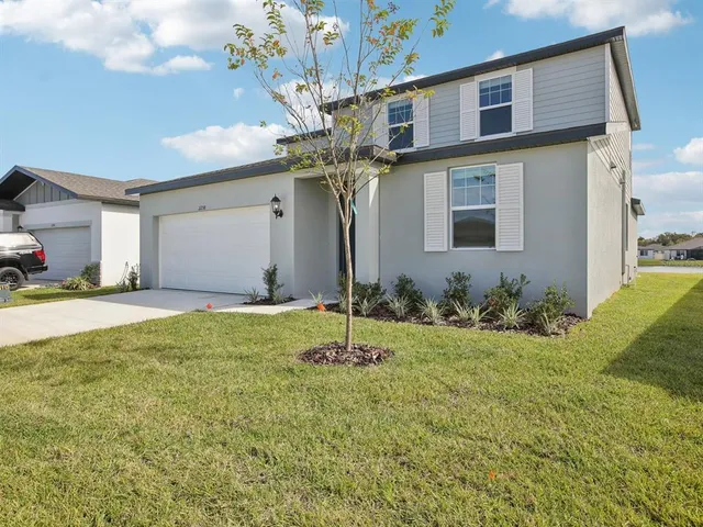 a house view with a garden space