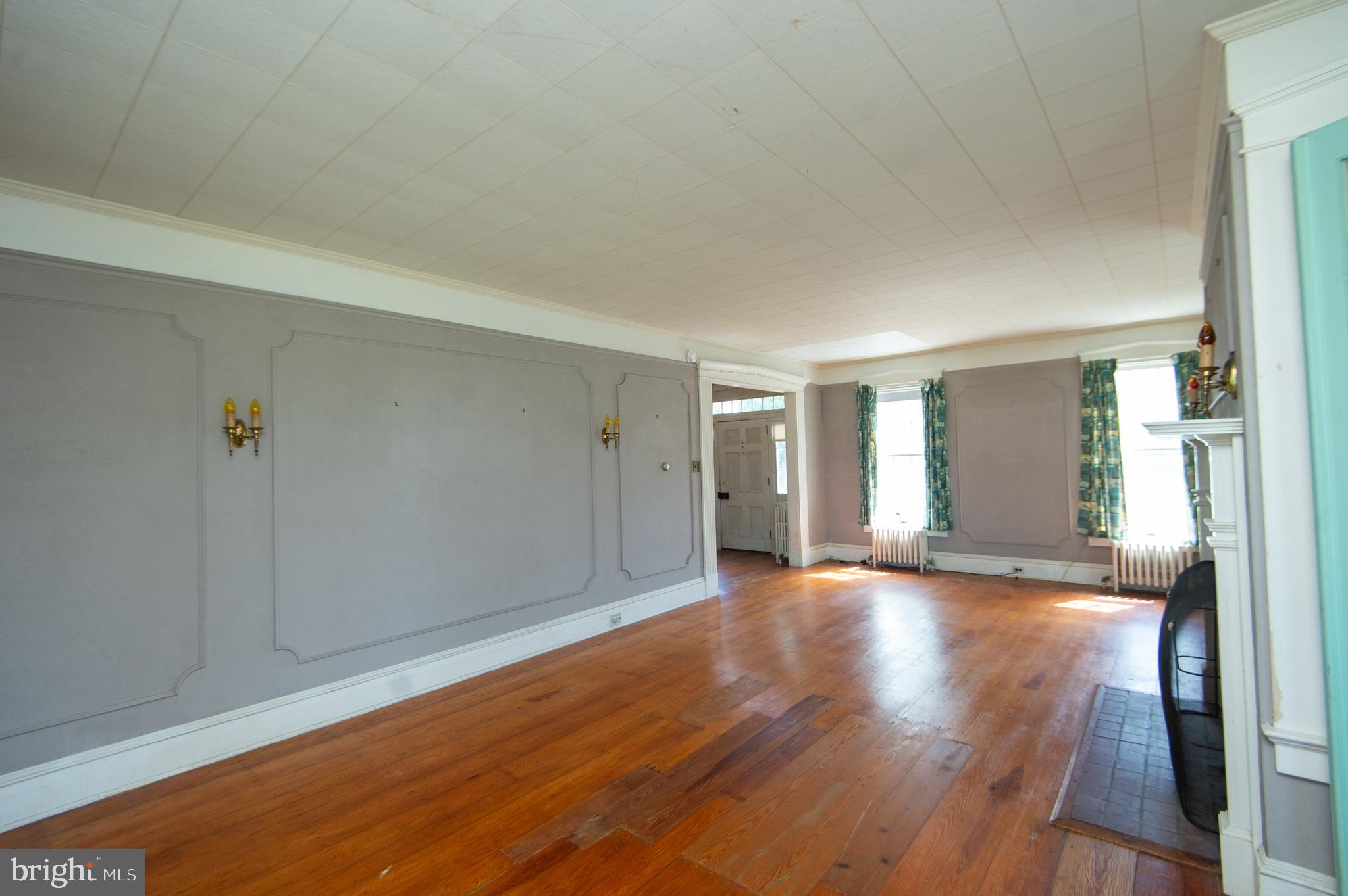 4910 Gregory Road Cambridge, MD 21613 - Photo 11 of 131 Raised Panel and Wall Sconces