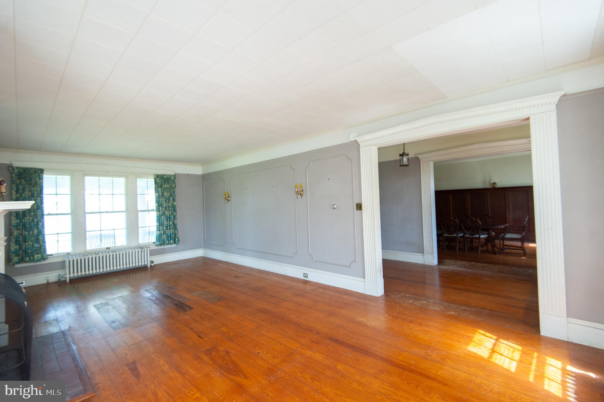 4910 Gregory Road Cambridge, MD 21613 - Photo 12 of 131 Living Room opens to Foyer & Dining Room