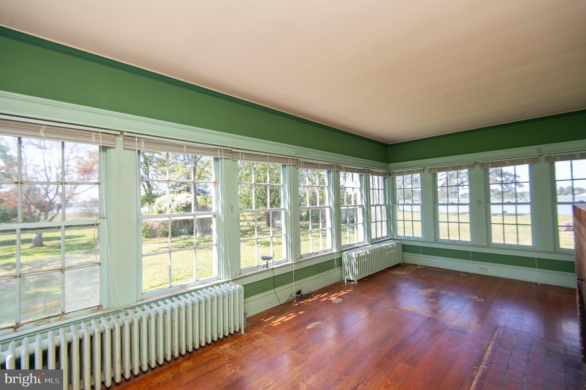 4910 Gregory Road Cambridge, MD 21613 - Photo 13 of 131 Sunroom with water & pool views