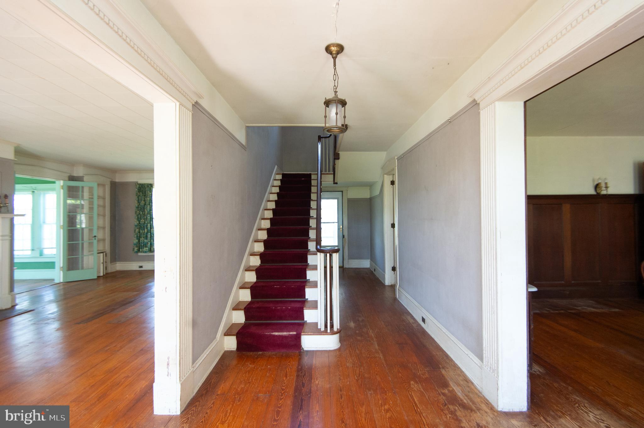 4910 Gregory Road Cambridge, MD 21613 - Photo 23 of 131 Foyer leads to waterside screened porch & office
