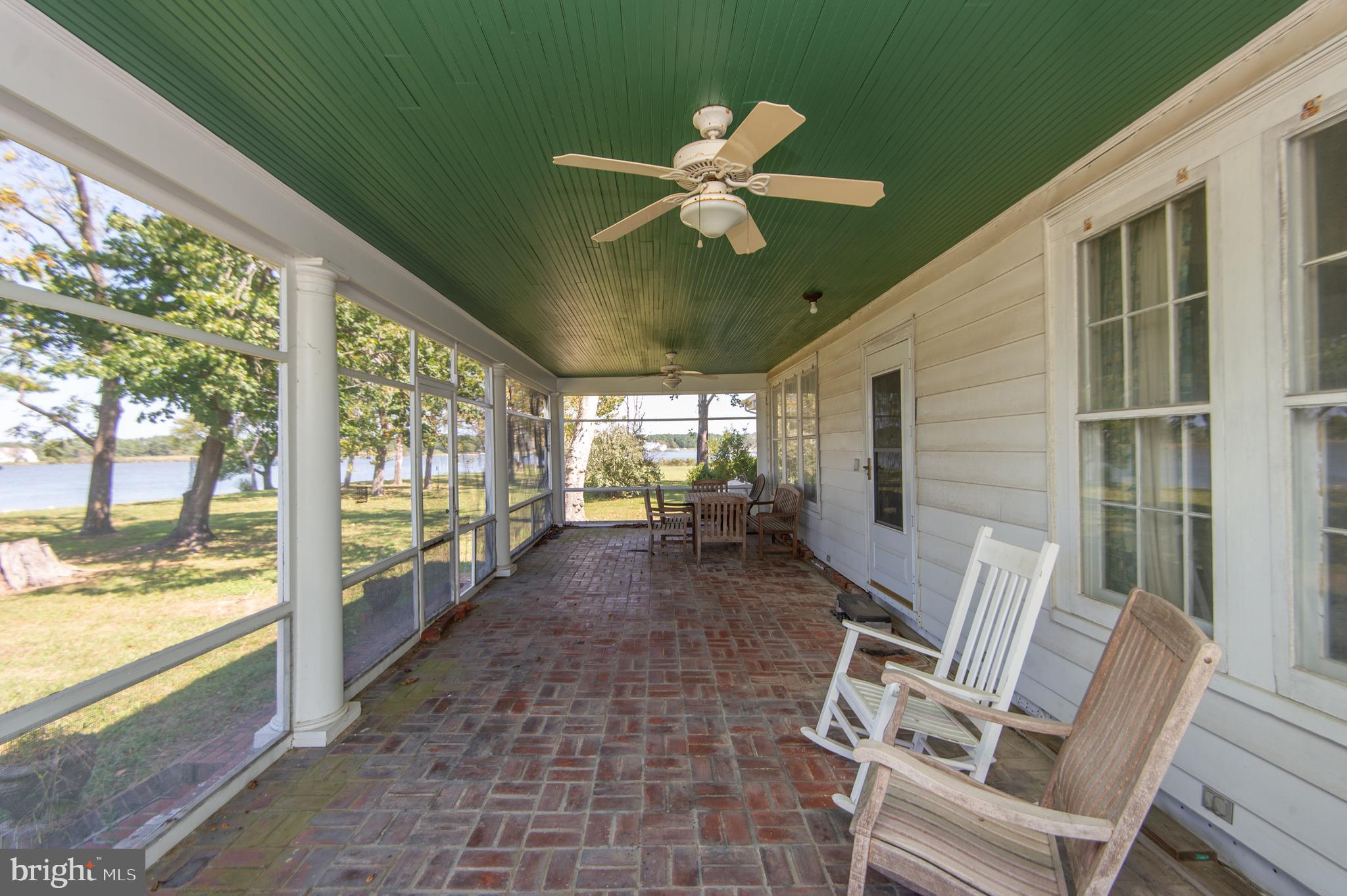 4910 Gregory Road Cambridge, MD 21613 - Photo 27 of 131 Waterside screened porch