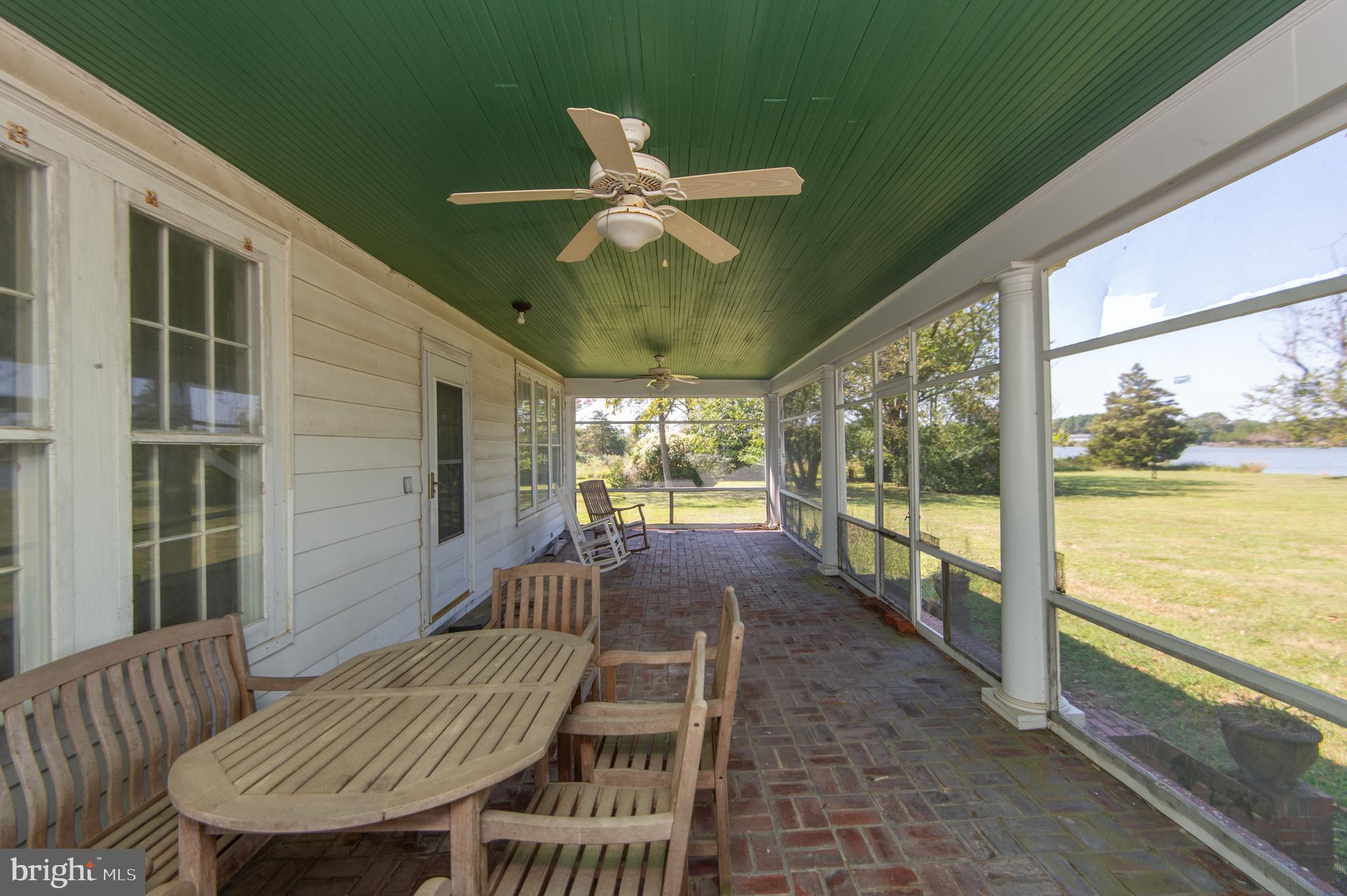4910 Gregory Road Cambridge, MD 21613 - Photo 30 of 131 Screened porch