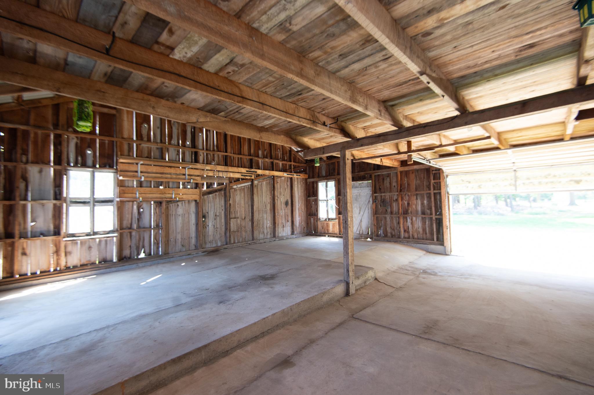 4910 Gregory Road Cambridge, MD 21613 - Photo 87 of 131 Barn interior circa 1800's wood used to construct