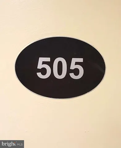 a close up of a wall with a sink