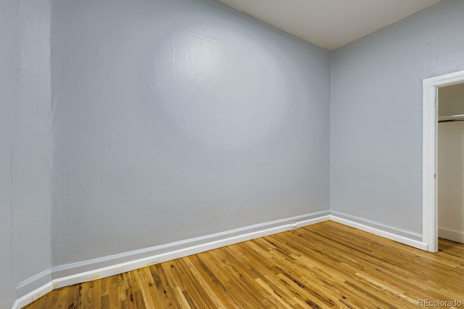 3515 North Williams Street, Unit 3517 Denver, CO 80205 - Photo 11 of 29 a view of empty room with wooden floor
