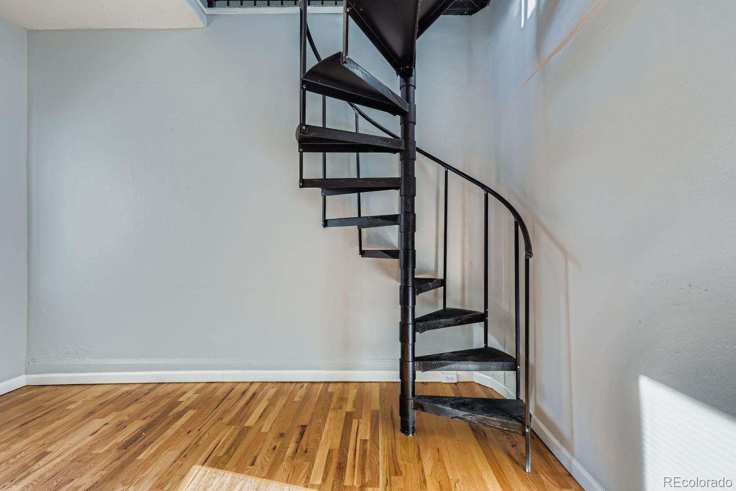3515 North Williams Street, Unit 3517 Denver, CO 80205 - Photo 17 of 29 a view of entryway with wooden floor