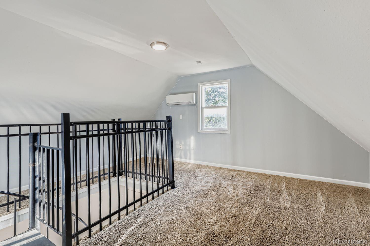 3515 North Williams Street, Unit 3517 Denver, CO 80205 - Photo 23 of 29 an empty room with windows