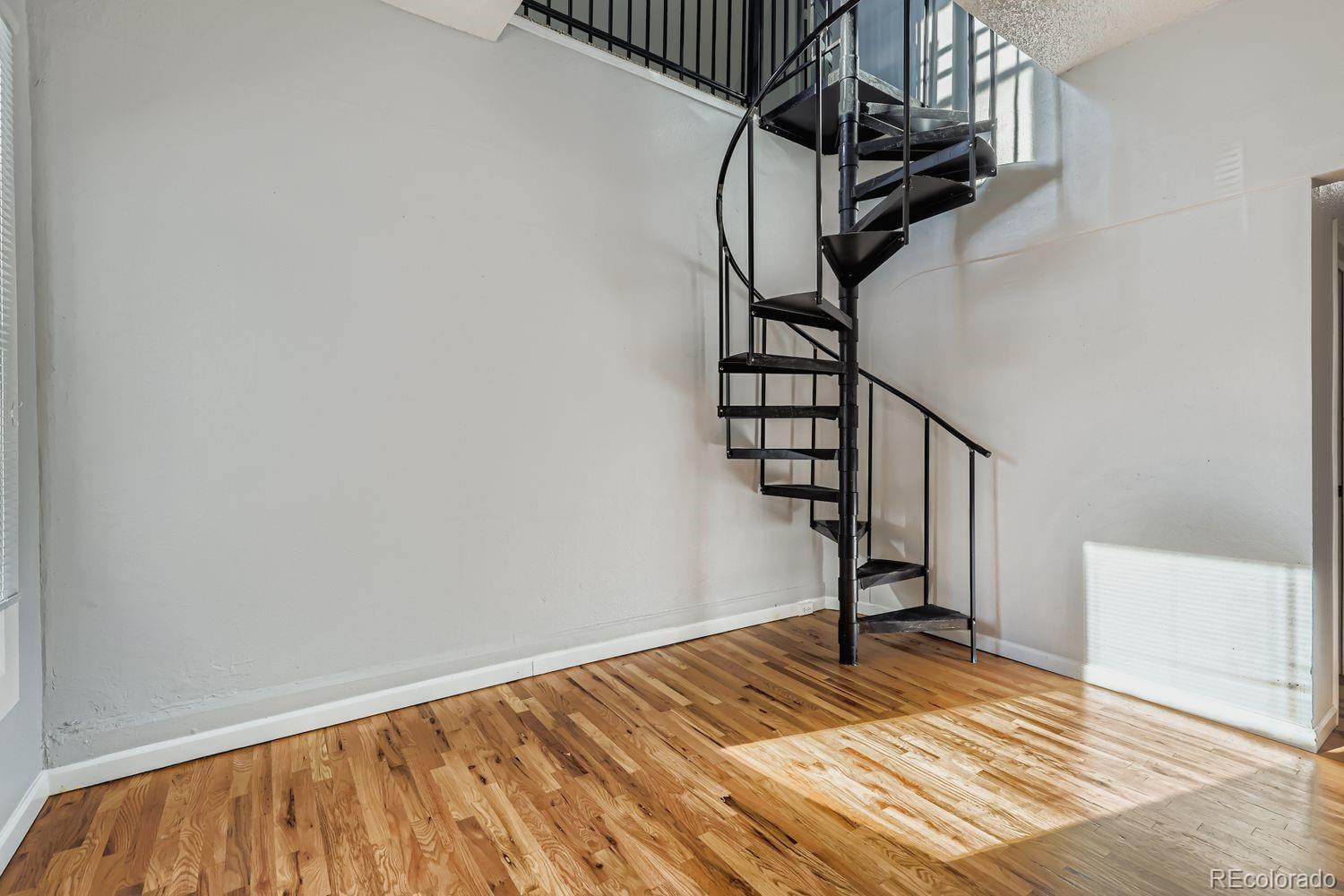 3515 North Williams Street, Unit 3517 Denver, CO 80205 - Photo 5 of 29 a view of entryway with wooden floor