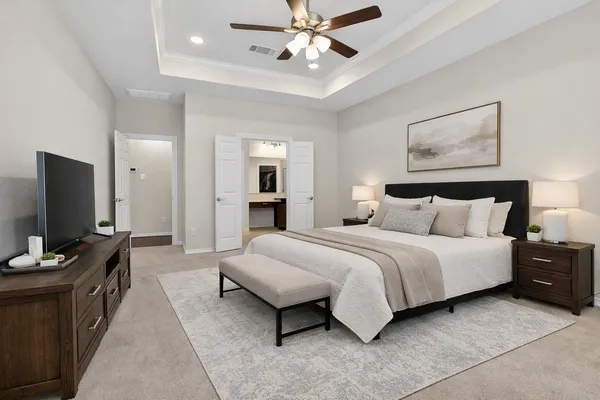 a spacious bathroom with a bathtub shower sink mirror and toilet