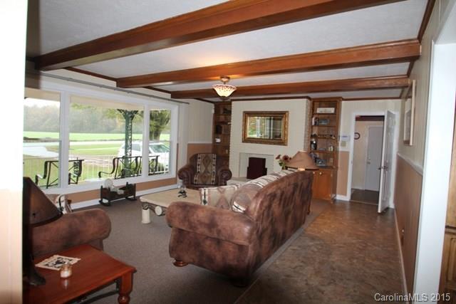 1424 Tot Dellinger Road Cherryville, NC 28021 - Photo 2 of 24 a living room with furniture and a fireplace