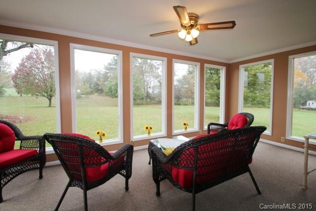 1424 Tot Dellinger Road Cherryville, NC 28021 - Photo 22 of 24 a living room with furniture and a large window