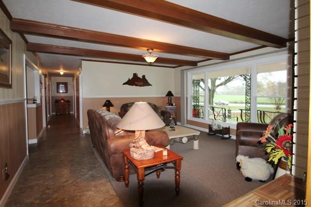 1424 Tot Dellinger Road Cherryville, NC 28021 - Photo 4 of 24 a living room with furniture and a large window