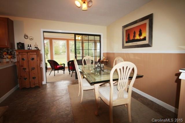 1424 Tot Dellinger Road Cherryville, NC 28021 - Photo 6 of 24 a view of a dining room with furniture window and wooden floor