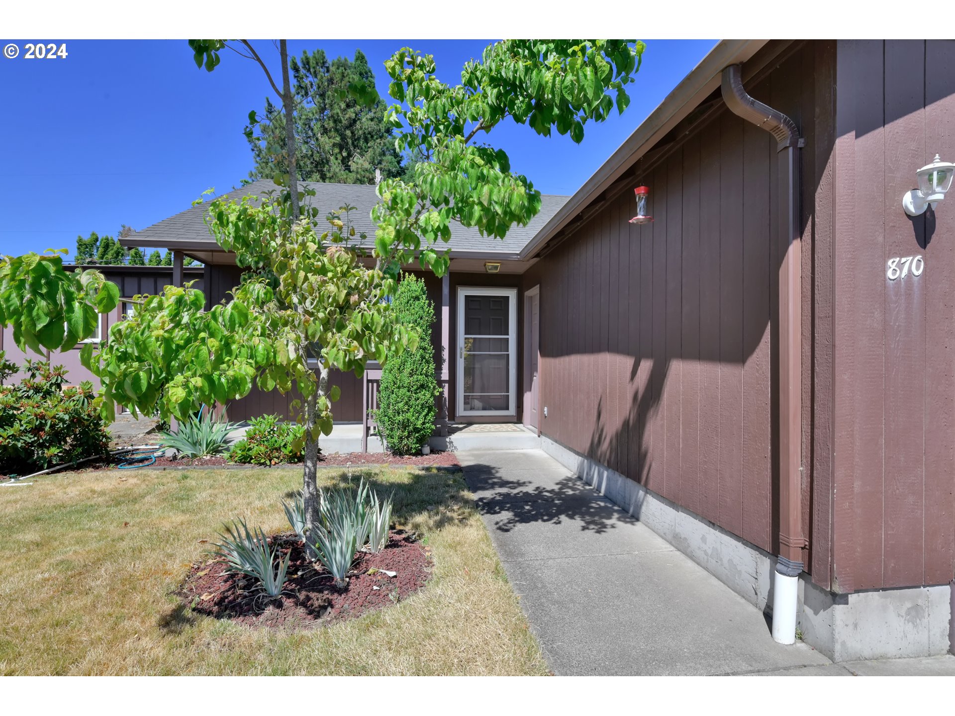 870 Hazelnut Lane Springfield, OR 97478 - Photo 5 of 35 a view of backyard with outdoor seating and green space