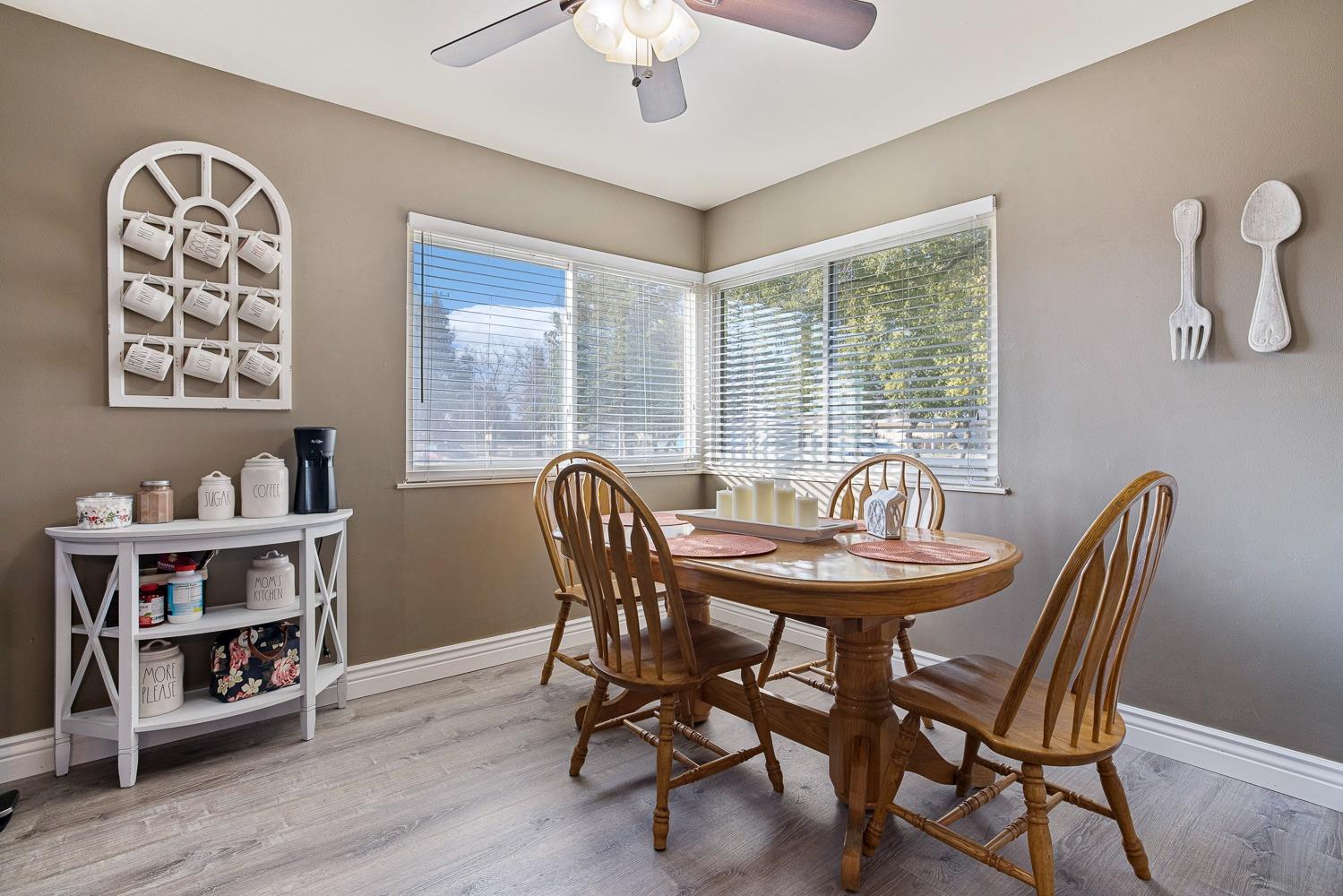 5780 North Angus Street Fresno, CA 93710 - Photo 14 of 41 a view of a dining room with furniture window and wooden floor