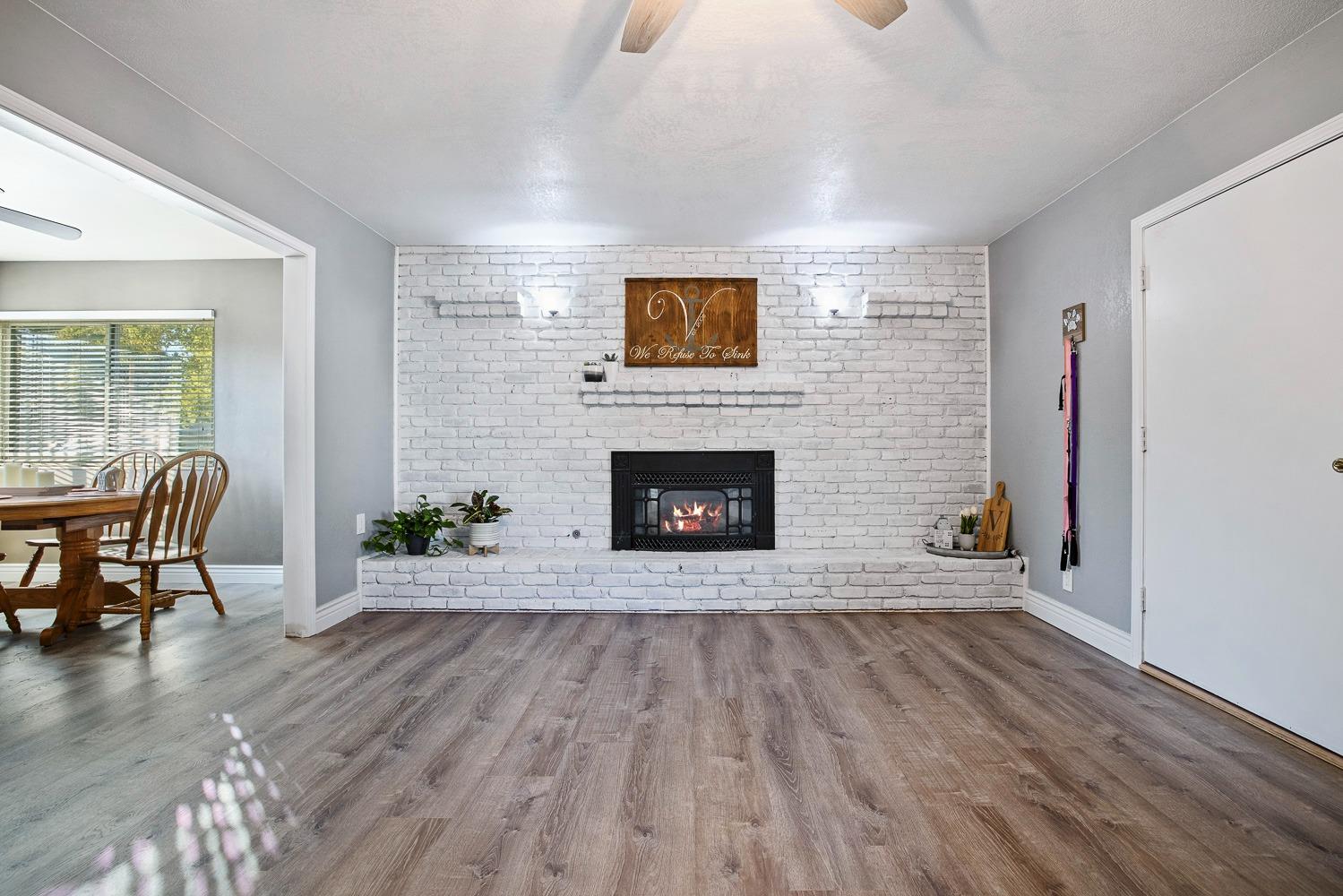 5780 North Angus Street Fresno, CA 93710 - Photo 18 of 41 a view of a livingroom with furniture and a fireplace