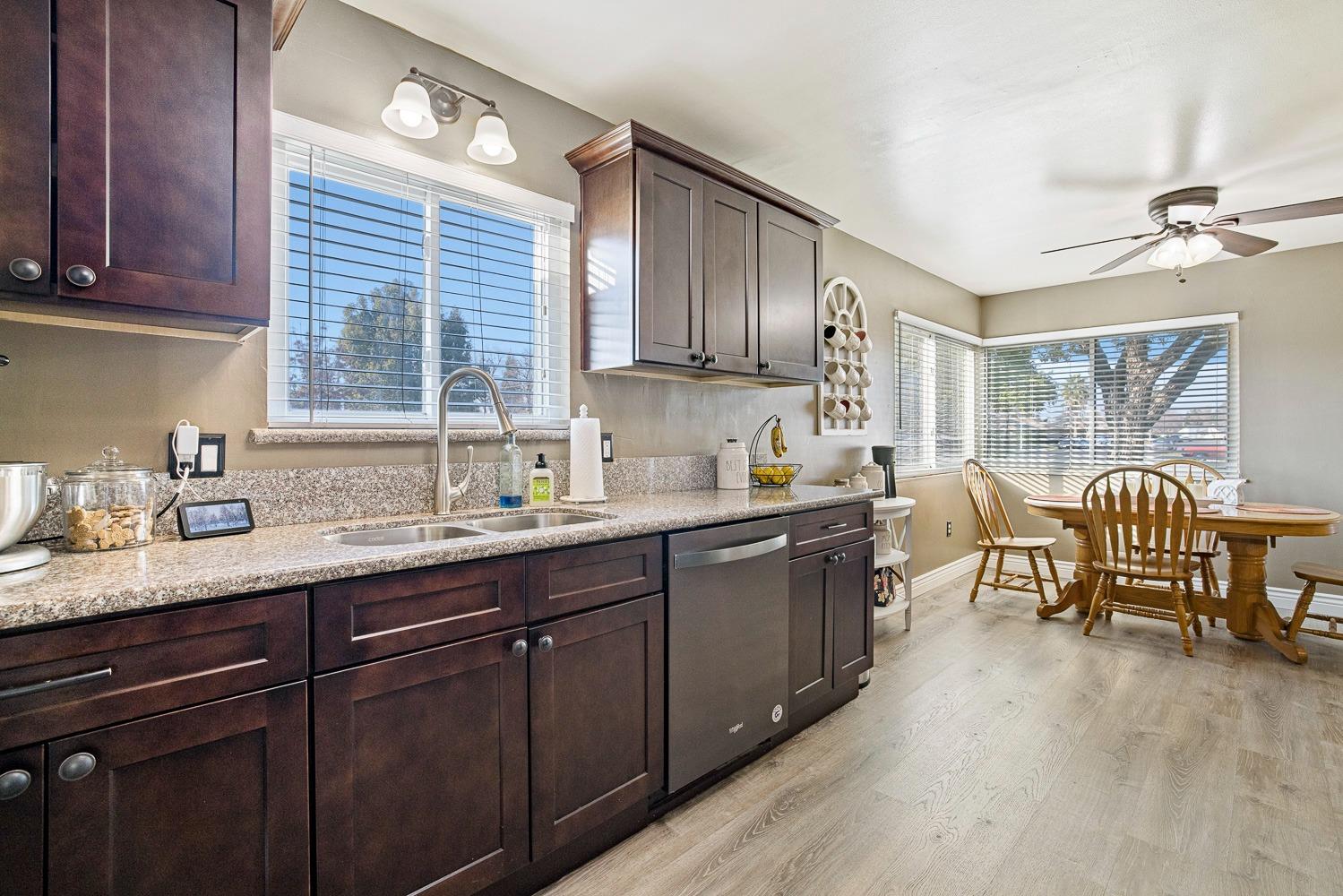 5780 North Angus Street Fresno, CA 93710 - Photo 8 of 41 a kitchen with granite countertop lots of counter top space and breakfast area