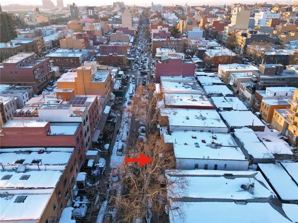 an aerial view of a city with lots of residential buildings