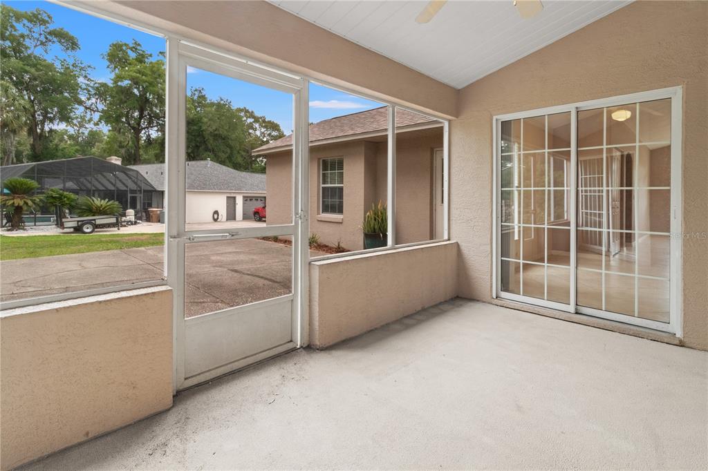 1617 Southeast 29th Terrace Ocala, FL 34471 - Photo 22 of 42 a view of an house with backyard and porch