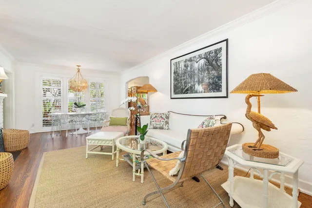 a large kitchen with stainless steel appliances granite countertop a lot of counter space and wooden floor